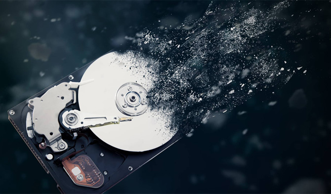 Graphical image showing hard disk being shredded into dust